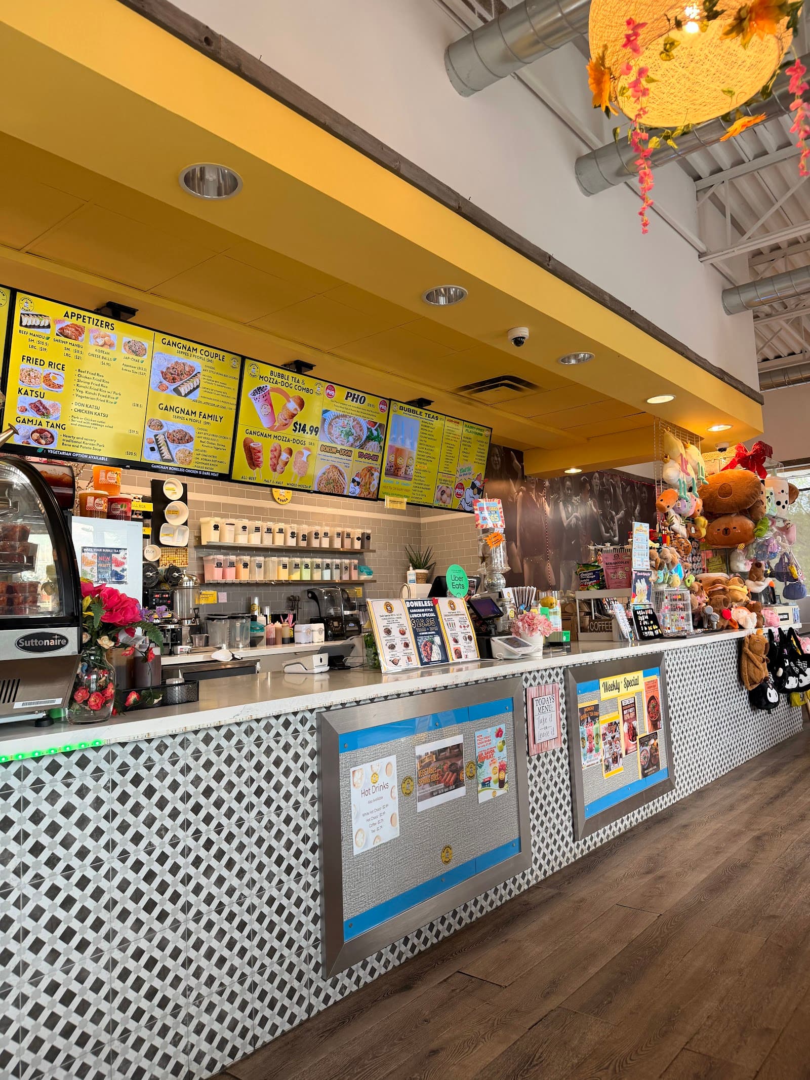 The counter and menu boards inside Gangnam Korea